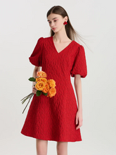 a lady in red jacquard v-neck mini dress
